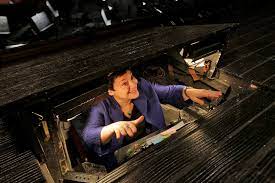 A booth projecting above the floor in the front of a stage where the prompter sits; Leonia S Donna Racik Plays Monkey In The Middle To Keep The Music Playing At The Metropolitan Opera Nj Com