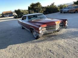 Image result for Claret Maroon 1966 Cadillac