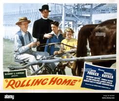 ROLLING HOME, Jimmy Conlin, Russell Hayden, Robert Buzz Henry, Jo Ann  Marlowe, 1946 Stock Photo
