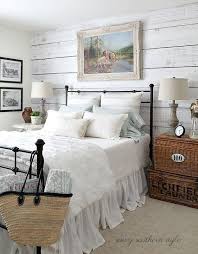 Farmhouse Bedroom With Barnwood Accent Wall Baskets Side Table Is Black Iron Bed Farmhouse Style Bedroom Decor Farmhouse Bedroom Decor Rustic Master Bedroom