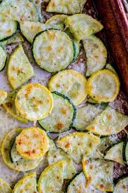 Parmesan Crusted Zucchini And Yellow Squash From The Food Charlatan Do You Have In 2020 Zuchinni And Squash Recipes Roasted Zucchini And Squash Yellow Squash Recipes