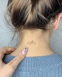 What does to infinity and beyond tattoo mean? Infinity Arrow Tattoo On The Back Of The Neck