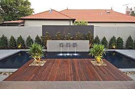 Contemporary Backyard With Asian Themes On Drake Street Melbourne By Cos Design Modern Backyard Design Modern Backyard Small Backyard Decks