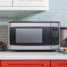 Wait for the 'l,' which indicates the microwave is locked, to disappear from the display. Ge Jes1145sh Ss 1 1 Cuft Countertop Microwave Brandsmart Usa