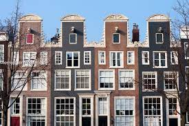 traditional historic dutch gable houses beside canal in amsterdam haus nieder