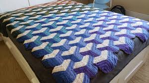 Handmade baby blue yellow crochet afghan knit throw striped blanket in 48 x 48. 15 Crochet Blankets To Keep You Cozy