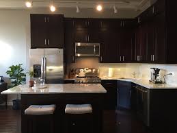 So putting together a dark cabinet and white granite countertop are breathtaking as a contrast creating. River White Granite Countertops Stone City Kitchen Bath Design