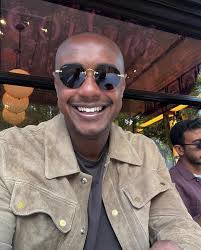 Rene Magritte's La Reproduction Interdite was commissioned by the English  poet and collector Edward James, a key patron of Surrealism. The painting  depicts James standing before a mirror, yet rather than reflecting