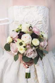 Fall wedding flowers and centerpieces are created from a rich mix of gorgeous foliage and and deep seasonal shades. Rose And Poppy Bouquet Disney Wedding Fairy Tale Wedding Wedding Honeymoons