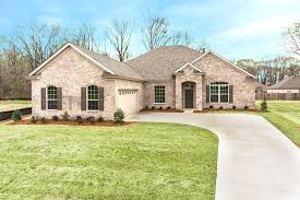 Beautiful House With Light Brown Brick Exterior Along With Dark Brown Shutters A Two Car Garage And Brick Exterior House Exterior Brick Brown House Exterior
