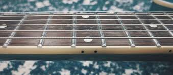 The low e should be 2.2mm and the high e should be 1.7mm for most players. Guitar Action The Complete Guide To String Height Action Adjustments