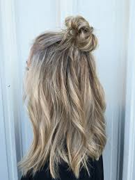 This type of hairstyle gives the half up half down style a completely different look. 20 Fun Top Buns Knots For Summer Hairstyles Weekly
