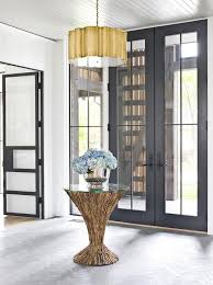 4.5 out of 5 stars with 74 ratings. Gold Scalloped Chandelier Over Round Foyer Table Contemporary Entrance Foyer
