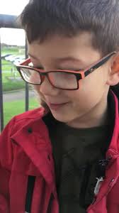 An excited child awaits the return of his dad at RNAS Culdrose