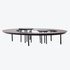 The table comes in 2 designs. Wooden Bean Coffee Table Nada Debs The Invisible Collection