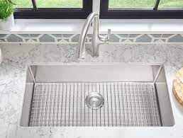 I don't like them b/c there is usually food under. How To Choose A Kitchen Sink Grid Riverbend Home