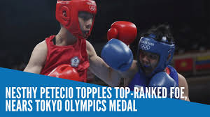 Nesthy petecio became a world champion after winning gold in the aiba women's world boxing championships 2019. Nesthy Petecio Topples Top Ranked Foe Nears Tokyo Olympics Medal Inquirer Sports