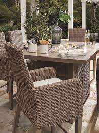 Beachcroft Outdoor Dining Table And 4 Chairs Ashley Furniture Homestore In 2020 Outdoor Dining Table Fire Pit Table Set Furniture