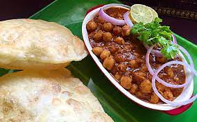 This dish is typically eaten for breakfast. A Mouthful Of Tangy Temptation Chole Bhature Is Definitely One Of India S Most Delectable Foods