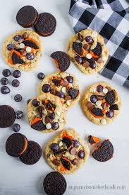 They combine rich chocolate cake, an orange oreo creme frosting and halloween sprinkles. Halloween Oreo Cookies Recipe By My Name Is Snickerdoodle