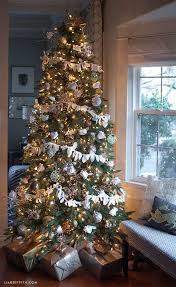 A christmas tree dusted with snow looks even frostier when decorated exclusively in shades of silver, white, and cream. 55 Christmas Tree Decoration Ideas Best Christmas Tree Decorations