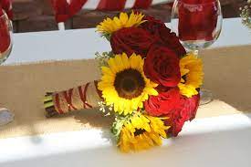 Sunflowers And Red Roses In A Bridal Bouquet Made At Your Local Riverside Ca Flower Shop Sunflower Themed Wedding Sunflower Wedding Bouquet Sunflower Wedding