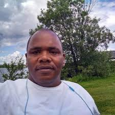 Who can sand and repaint the side of a garage in Tupper Lake?