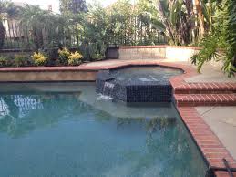 New Pebble Plaster With 2x2 Nebula Blue Waterline Tile And 12x12 Chocolade Tiles For Bond Beam Atlaspools Pool Remodel Backyard Pool Outdoor Spaces