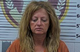 JUST IN: A 51-year-old woman faces murder charges in Copperhill after  police say she shot her boyfriend to death with a .410 shotgun after an  argument over a bag. READ MORE: https://bit.ly/4fU7rEA