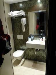 The bathtub of volcanic limestone and resin is by victoria + albert, and a ladder shelf keeps towels at a hand's reach. Bathroom Picture Of Hotel Design Sorbonne Paris Tripadvisor