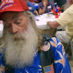 On his brother's shoulder