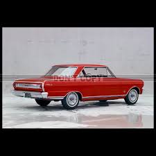 Image result for Regal Red 1965 Chevy II