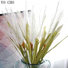 The arrangement is lush and looks incredibly real and elegant. Flower Background Party Home Decoration Feather Grass Fake Bouquet Artificial Flower Large Artificial Flower Buy Decorative Artificial Flower Simulation Flower Feather Grass Artificial Artificial Flowers Artificial Flowers Decorated Feather Grass