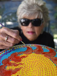 Local artists paint YWCO camp stools for silent auction, OCAF exhibit