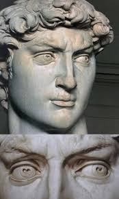 David has heart-shaped pupils. Statues often have a slit in the pupils, to  give them some depth, but they are just simple, vertical slits. David's  eyes instead have clearly heart-shaped pupils. The