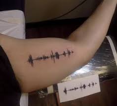 Others make use of swells. Soundwave Tattoo Near Me