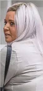 Woman cleared of plotting to cut off love rival' s finger