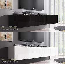 Black And White Tv Stand Black Gloss Floating Tv Unit Purple Wall Google Search Floating Tv Unit Tv Unit Purple Walls