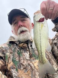 Well not a bad morning. Yes it cold and windy but still caught fish. My son  Ryan Phillips came down from Cleveland missed a few but he finally got one 