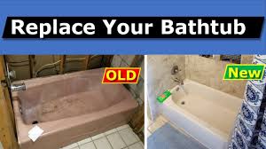 If removing tile, cut along a grout line using a grout remover tool and pry away the tiles using a stiff putty knife. How To Install A Bathtub Old Tub Removal Diy Youtube