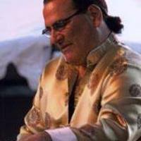 David Garfield's credo is 'giving back' to his fans