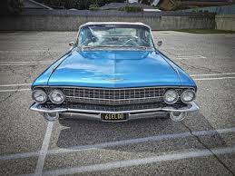 Image result for Dresden Blue 1961 Cadillac