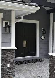 Gray, white, pewter, and black work together in this gorgeous bathroom by shed brand studios. Gray And White Home Marble Dark Wood And More Gray House Exterior House Exterior Exterior House Color