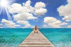 Maybe you would like to learn more about one of these? Pretty Beach Scene On A Bright Day With Woman Meditating Stock Photo Picture And Royalty Free Image Image 5575377