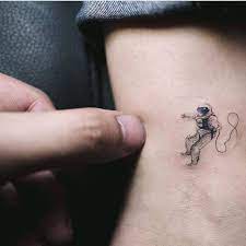 1.3m followers 31k followers 33k followers 10k followers. Fine Line Astronaut Tattoo On The Ankle