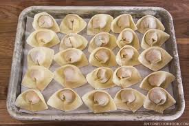 Transfer filled wrappers to prepared baking sheet and coat surface with cooking spray. How To Wrap Wontons How To Just One Cookbook
