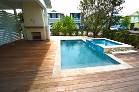 Your pool decking allows you to create a unique look for your entire. Cumaru Wood Decking Pool Decks In The Florida Panhandle Beach Style Deck Miami By Overseas Hardwoods Co Houzz