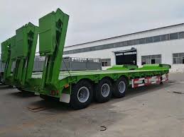 In most cases, they are used to haul cargo that would otherwise be too tall for legal height limits. What Is Low Bed Semi Trailer How To Select Lowboy Truck Trailer Low Bed Trailer Price