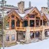 The log home also has a wrap around porch and cathedral ceilings in its design. 3