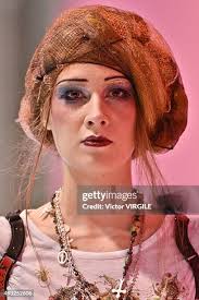 A model walks the runway during the h.NAOTO Ready to Wear show as... News  Photo